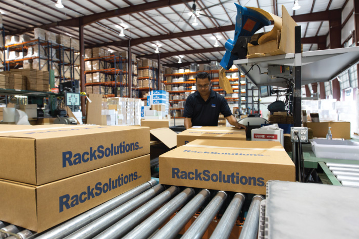 RackSolutions boxes moving along the packing line
