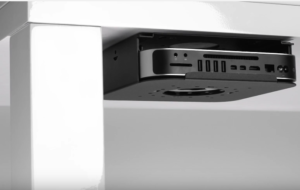 Mac mini mounted under a desk