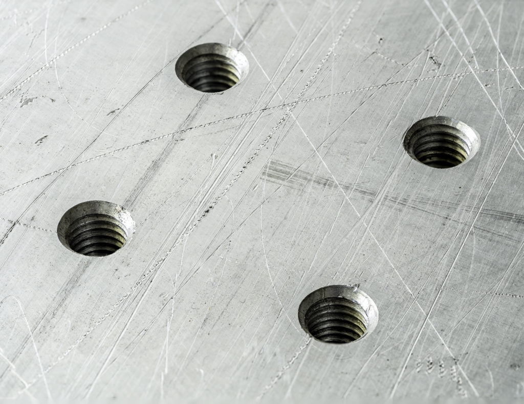 screw holes on aluminum plate
